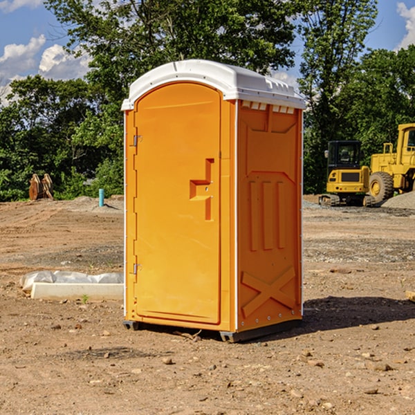 what is the cost difference between standard and deluxe portable restroom rentals in Rushville Ohio